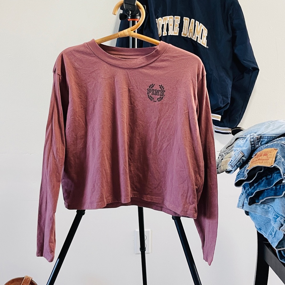 Victoria’s Secret pink long sleeve top.
